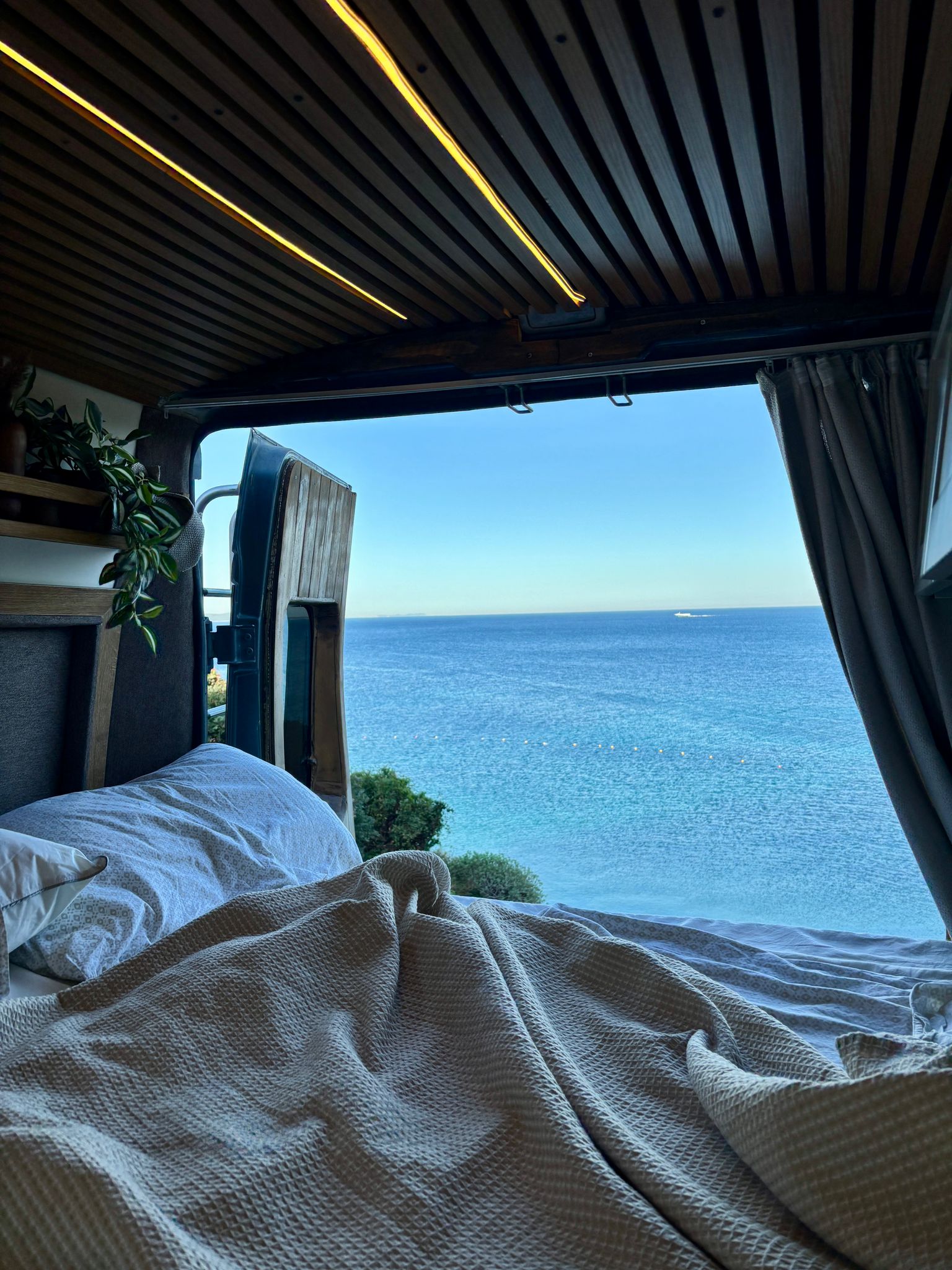 Campervan parked by the sea in Albania.